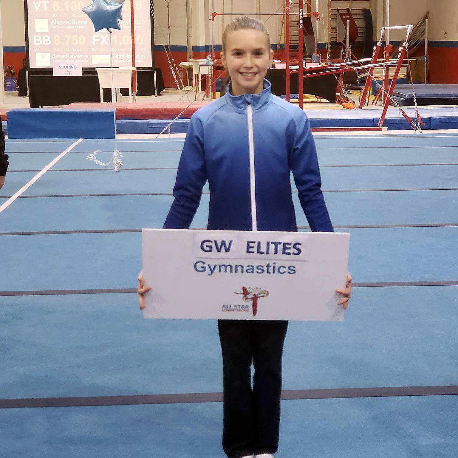 A GW Elites gymnast representing her club at a competion.