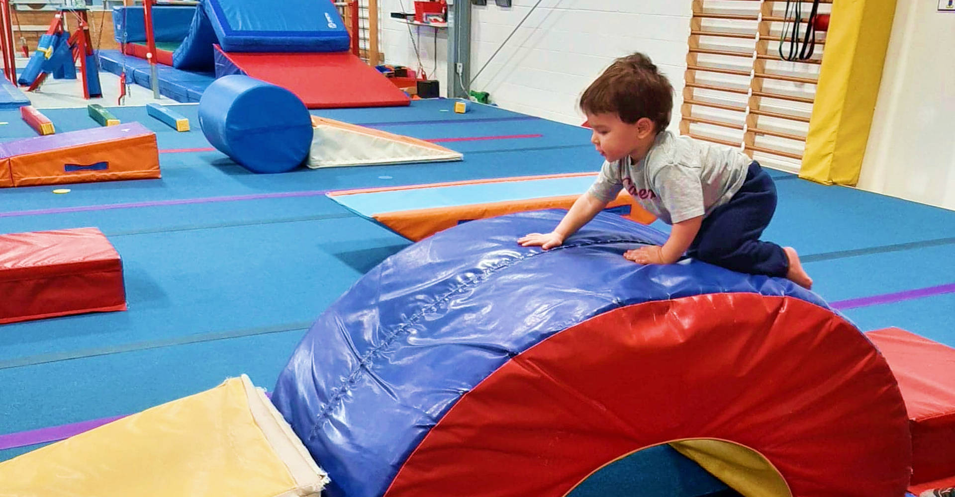 Tumbling Classes - Gymnasts training on the spring floor at Gymworld gymnastics facility in Northwest London, Ontario